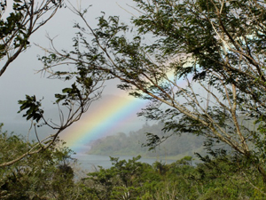 The rainbow hovers over nearby San Luis Cove, where there is a marina. 